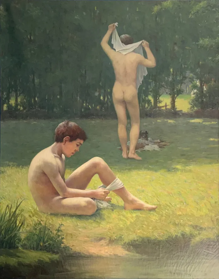 Two nude youths on a grassy riverbank, one seated, one standing and drying off